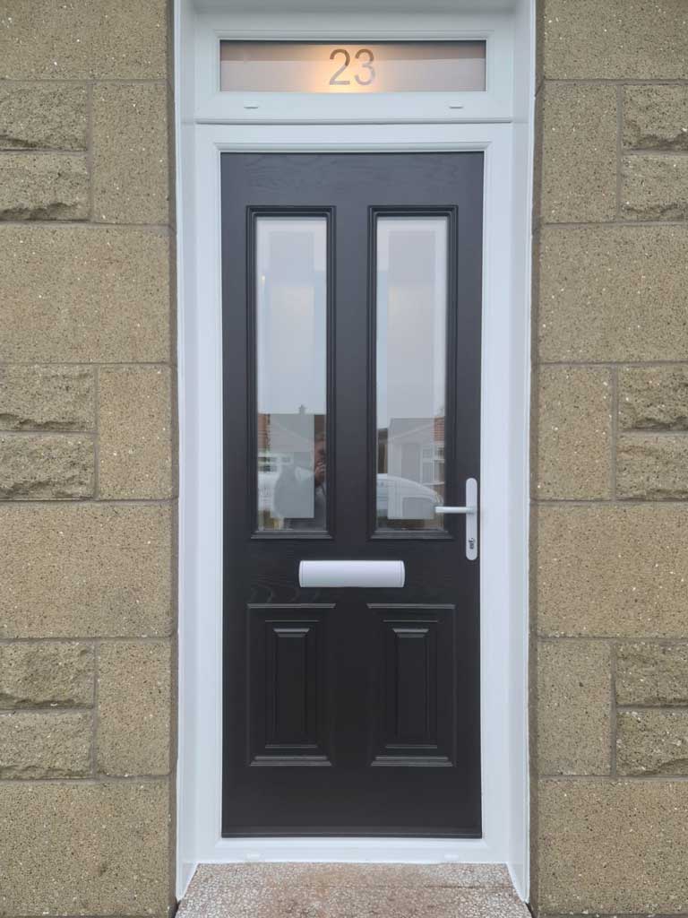 Black composite door with two upper glass panes