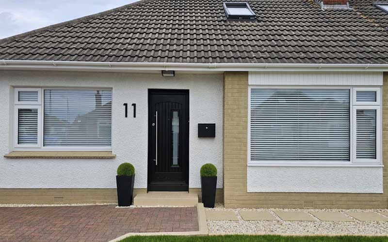 Read more about the article Crafting Elegance in Prestwick: Timeless White Veka Windows and a Striking Grey Palladio Door by Armour Home Improvements